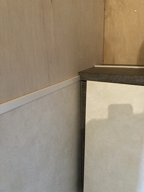 練馬区マンションリノベーション　トイレ　造作家具　納まり　腰壁パネル